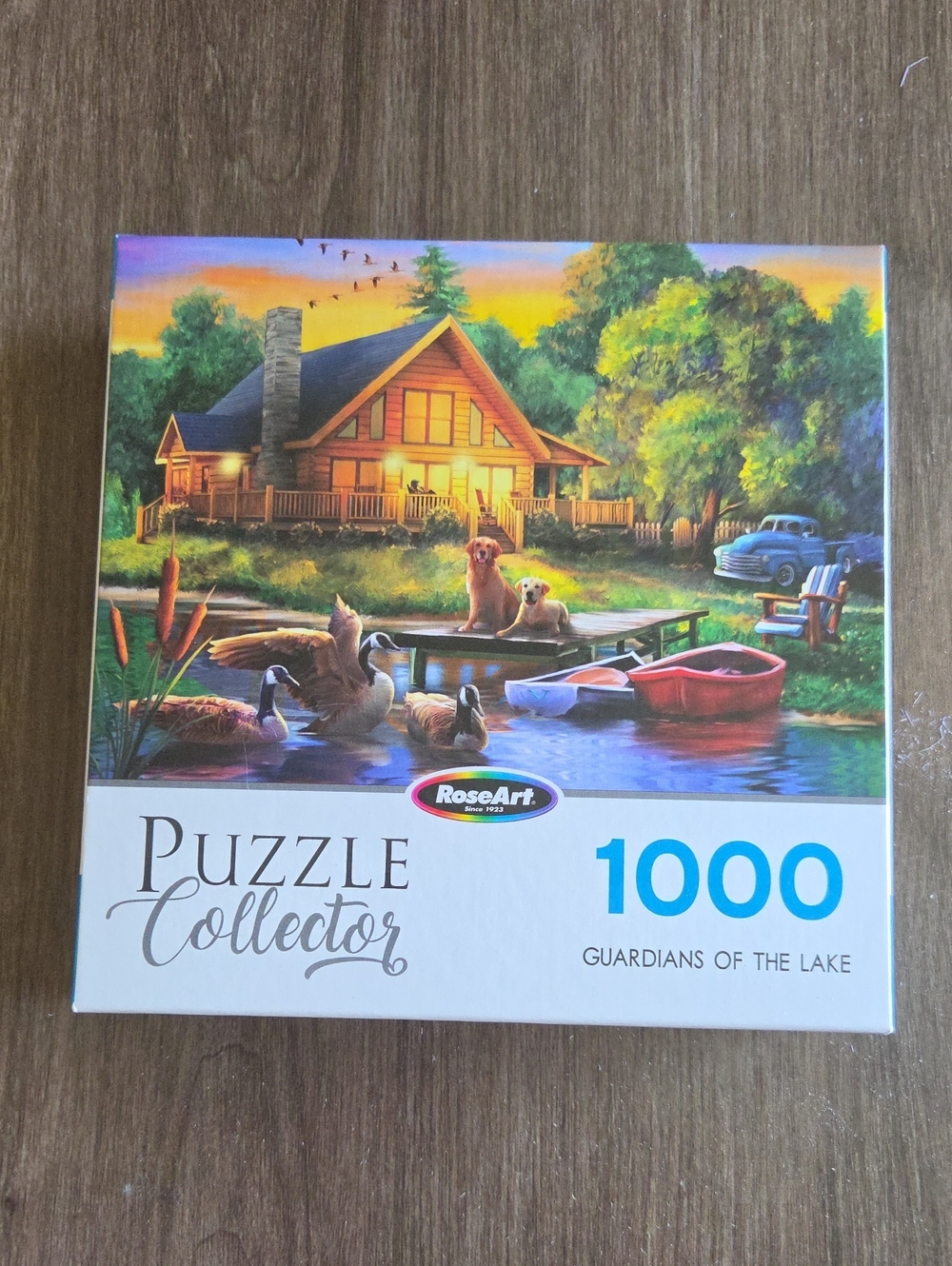 RoseArt 1000-Piece Puzzle — Lakeside Cabin Scene in Multicolor